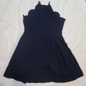 Navy blue skater dress with halter neckline and sc